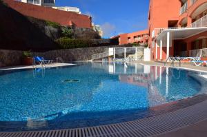 Bazén v ubytovaní Relax, descanso y una experiencia inolvidable alebo v jeho blízkosti