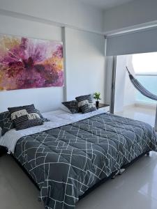 Lova arba lovos apgyvendinimo įstaigoje Playa Cartagena Apartments