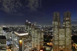 a city at night with skyscrapers at Keio Plaza Hotel Tokyo in Tokyo