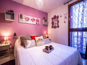Posteľ alebo postele v izbe v ubytovaní Confort et Praticité : Appartement 4 Pers. à St-Lary Village, Proche Commerces et Téléphérique - FR-1-296-455