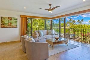 a living room with a couch and a table at WAILEA ELUA, #1509 condo in Wailea