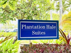 a blue sign that says plantation hate strikes at Kauai Plantation Hale Suites by Coldwell Banker Island Vacations in Kapaa