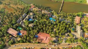 an overhead view of a group of houses and trees at Riva Beach Resort in Mandrem