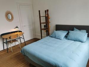 Posteľ alebo postele v izbe v ubytovaní Appartement 82 m2 proche centre ville