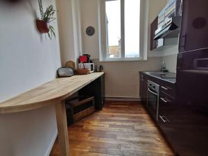 Kuchyňa alebo kuchynka v ubytovaní Appartement 82 m2 proche centre ville