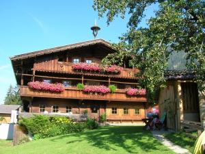 Zahrada ubytování Wörglerhof's Hüttenapartments mit Kachelofen
