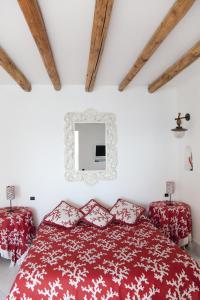 Postel nebo postele na pokoji v ubytování Villa Il Galeone