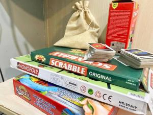 a stack of books sitting on top of a table at Room 35 in Manila