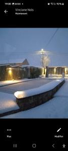 una foto de una foto de una calle cubierta de nieve en Le Clos Des Bansions en Jalhay