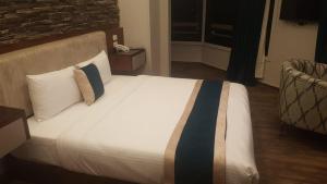 Voodi või voodid majutusasutuse River Nile Edge Boutique Hotel & Restaurant toas