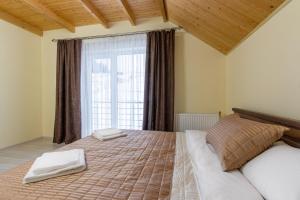 Letto o letti in una camera di Шепіт Лісу