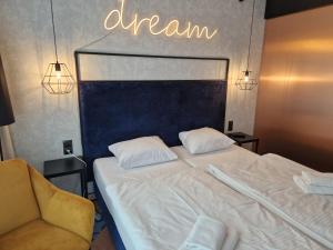 Łóżko lub łóżka w pokoju w obiekcie Biala Perla Sunny Mountain 602