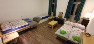 A bed or beds in a room at Appartement Belvedere Wien