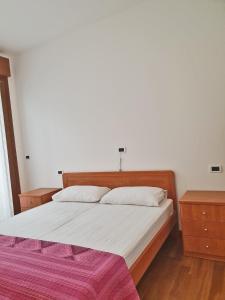 Postel nebo postele na pokoji v ubytování Casa Comisso