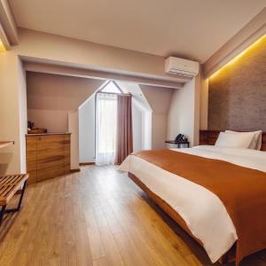 Katil atau katil-katil dalam bilik di Ivy Hotel