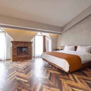 Katil atau katil-katil dalam bilik di Ivy Hotel