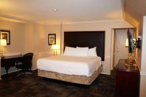 Voodi või voodid majutusasutuse Wingate by Wyndham Bellingham Heritage Inn toas