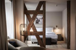 Cama ou camas em um quarto em HOTEL & SPA Goldene Rose