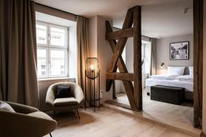 Cama ou camas em um quarto em HOTEL & SPA Goldene Rose