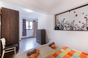 Postel nebo postele na pokoji v ubytování Corner view apartment
