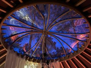 a ceiling with a glass window in a room at The Warren Yurt in Withyham