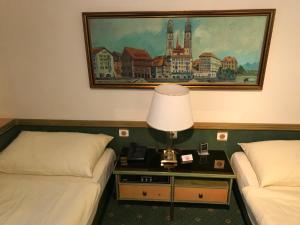 Rúm í herbergi á Hotel Arlette Beim Hauptbahnhof