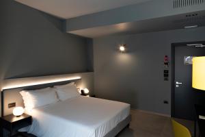 Letto o letti in una camera di Arryvo Hotel