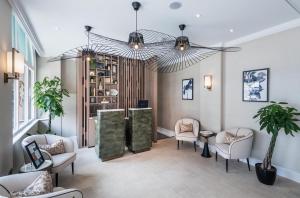 a lobby with chairs and a waiting room at Sloane Place in London