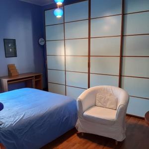 A bed or beds in a room at MìCè ottima soluzione per il centro e la Svizzera