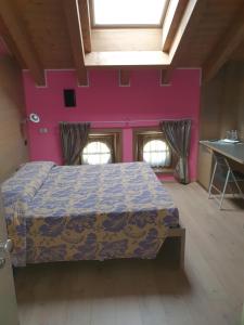 Postel nebo postele na pokoji v ubytování Residence Hotel Serenella