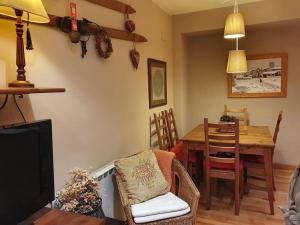 Posedenie v ubytovaní DUPLEX ABUHARDILLADO EN ESTERRI d'ÀNEU