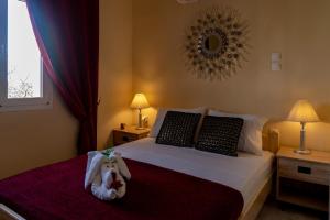 A bed or beds in a room at Chrispa's House