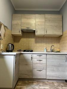 Kuchyň nebo kuchyňský kout v ubytování MAFA Apartaments