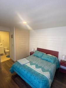 Ένα ή περισσότερα κρεβάτια σε δωμάτιο στο Condominio Rocura