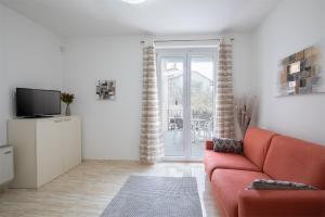 TV a/nebo společenská místnost v ubytování Apartments Villa Nina