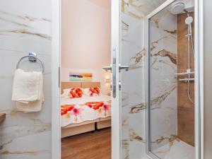 Postel nebo postele na pokoji v ubytování Villa Ana Apartments