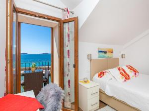 Postel nebo postele na pokoji v ubytování Villa Ana Apartments