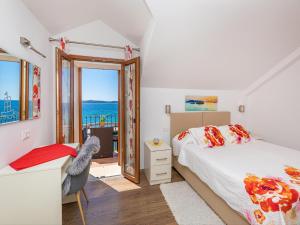 Postel nebo postele na pokoji v ubytování Villa Ana Apartments