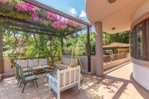 Balkon lub taras w obiekcie Modern Villas with gardens and stunning views