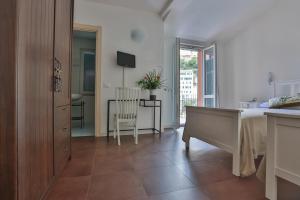 a kitchen with a table and a dining room at Affittacamere Le Giare in Riomaggiore