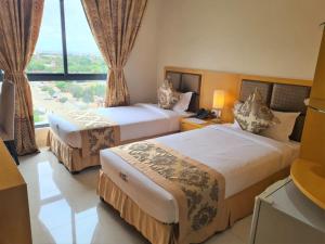 Hotel Express客房内的一张或多张床位