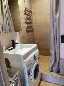 Et badeværelse på Апартаменты