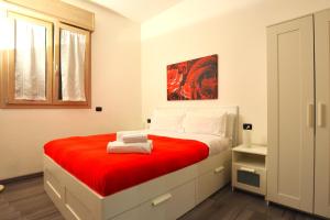 Postel nebo postele na pokoji v ubytování Harmony Lake Sirmione