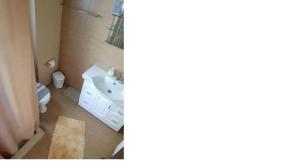 two pictures of a bathroom with a sink and a toilet at Vidakis Villas 4 in Sívas +15 photos
