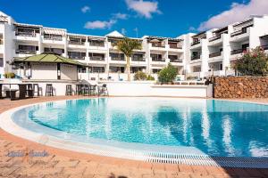 Basen w obiekcie Casa Patty, piscinas climatizadas, primera linea lub w pobliżu