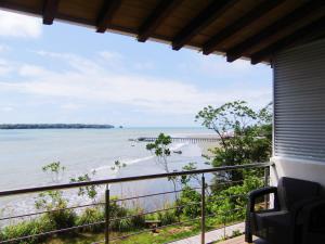a view of the beach from the balcony of a house at La Manigua hostal in Buenaventura