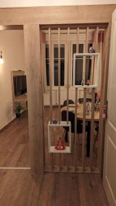 Μια τηλεόραση ή/και κέντρο ψυχαγωγίας στο Appartement Chez Mar'Tine