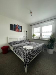 Postel nebo postele na pokoji v ubytování Friendly house in Bořetice