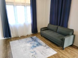 Posezení v ubytování WM Homestay Kota Bharu + 31 fotografií