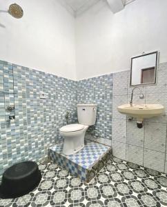 Koupelna v ubytování Watukarung Sackstone Guesthouse
